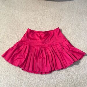 Gold hinge pink tennis skirt